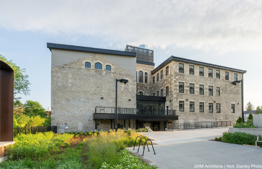 View of the distillery building from the River Walk, alongside the Speed River in downtown Guelph. Photo by SRM Architects | Nick Stanley Photo.