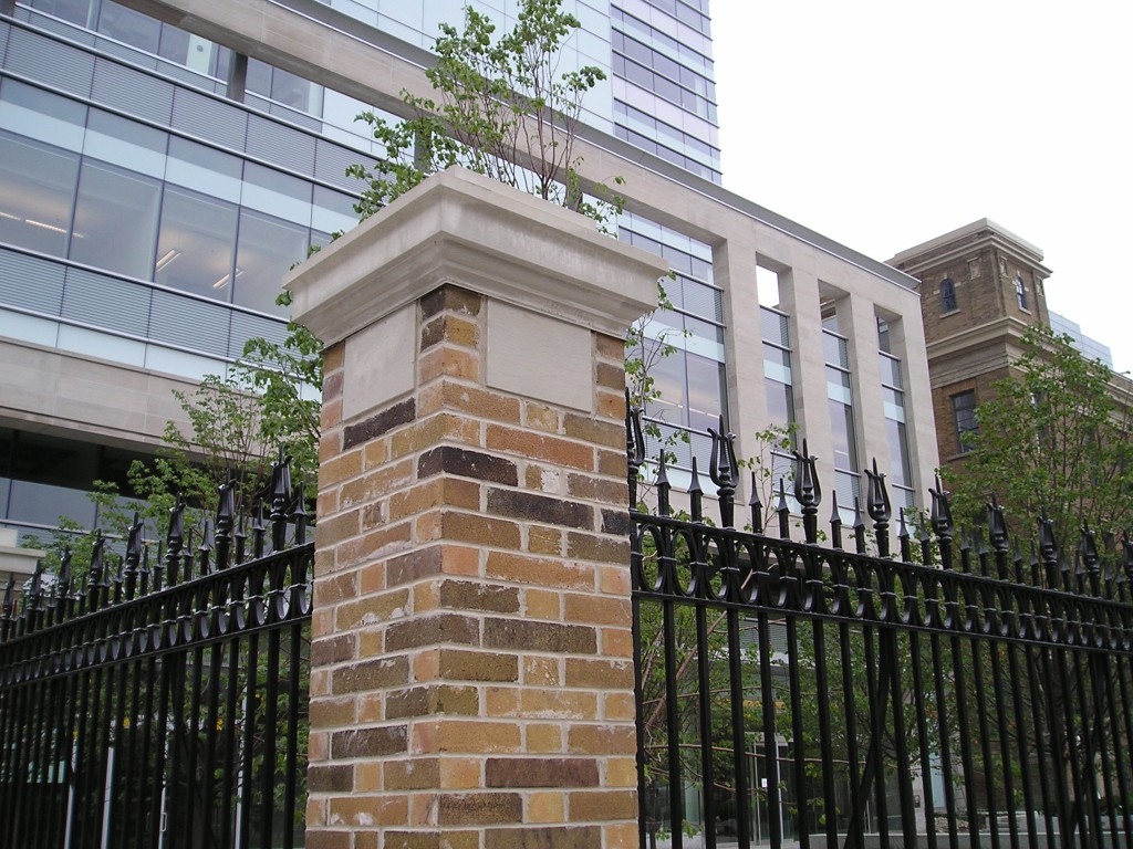 Detail of one of the restored brick and masonry columns.